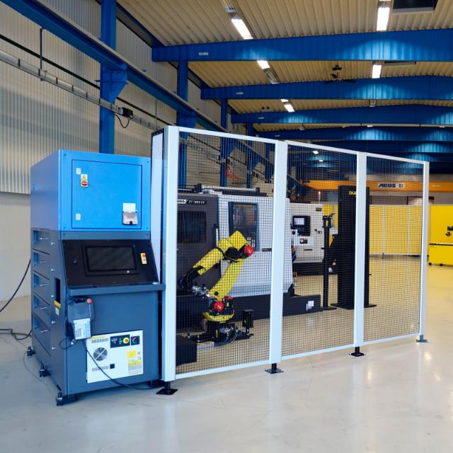 robotlösning installerad i bur