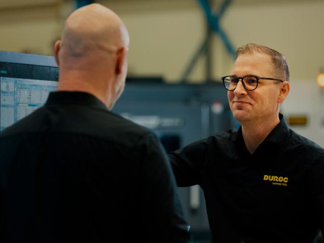 två medarbetare från Duroc
